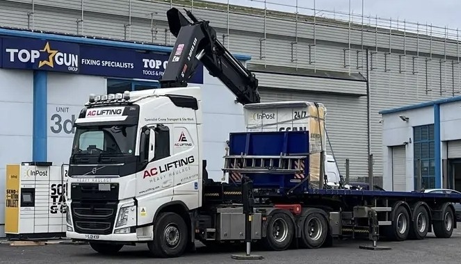 AC Lifting moving an InPost parcel locker cabinet — bespoke contract lift.
