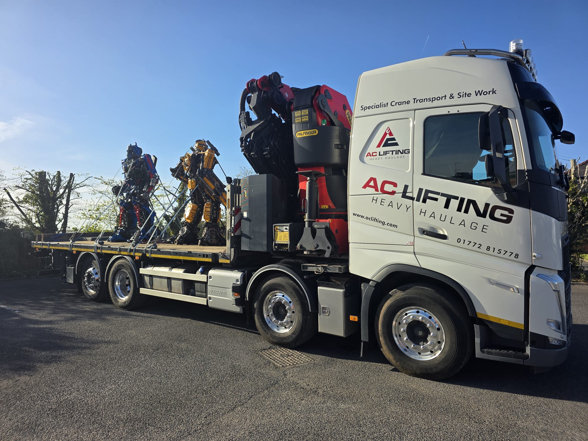AC Lifting transporting transformer sculptures — bespoke install for a customer site.