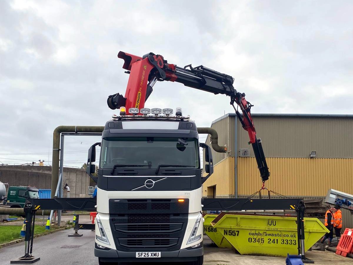 Branded AC Lifting truck and driver at the Preston depot, out-of-hours.