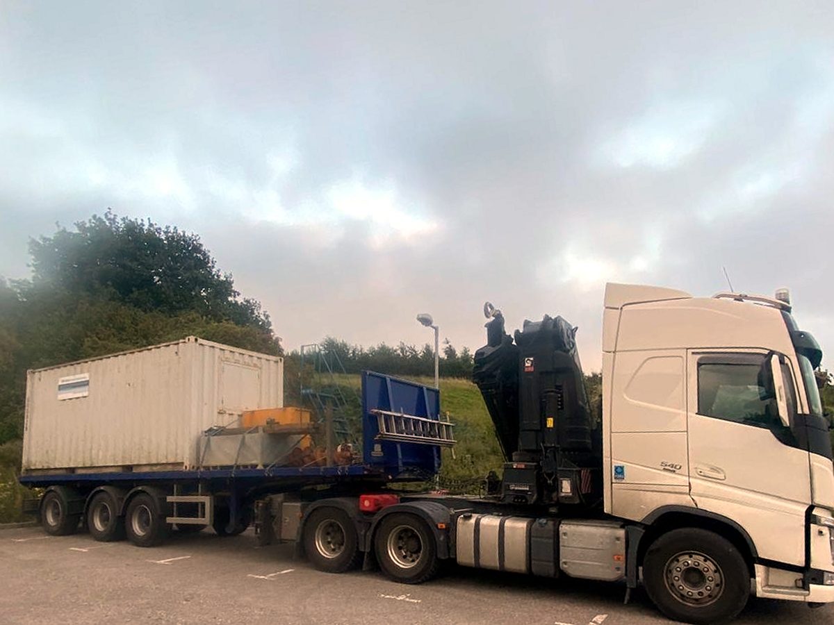 Two AC Lifting HIAB trucks travelling in convoy en route to a job.