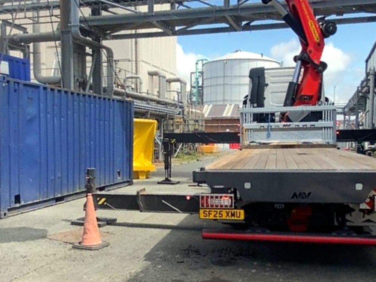 Out-of-hours HIAB lift in the evening light — AC Lifting works when sites need us.