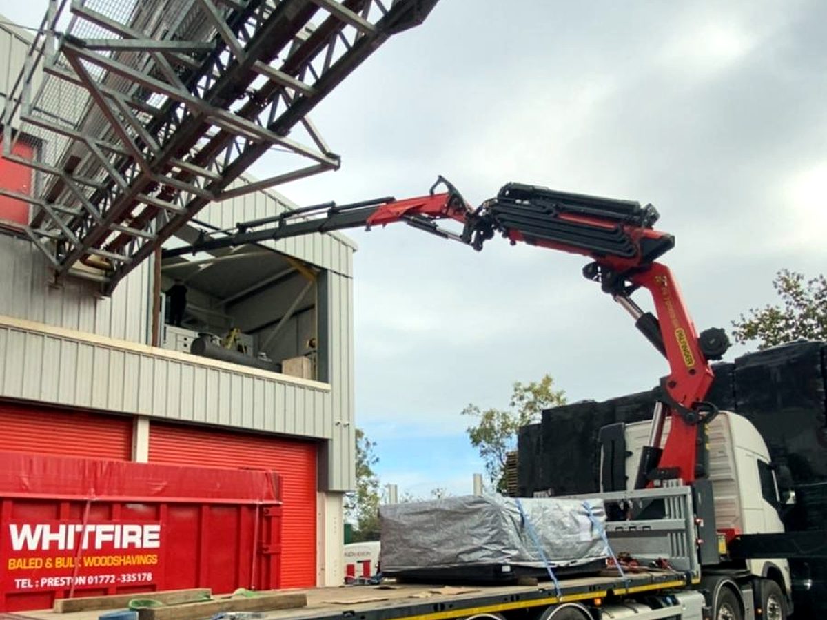 AC Lifting delivery at an industrial customer site — Whitfire Shavings & Sawdust Supplies.